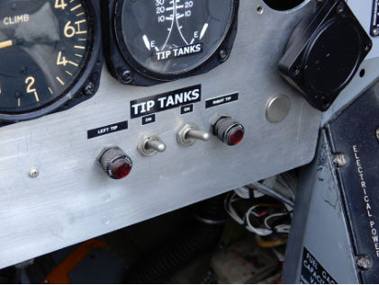 Photograph 4 – Tip Tank Switches and Lights (NTSB Photo), from the NTSB investigation of Temco/Lazier TT-1 accident near Laurel Hill, Florida, June 1, 2024