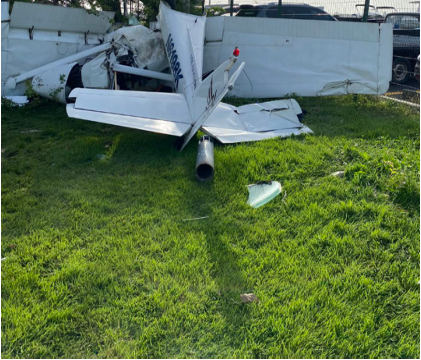 Photograph 3 – View of the tail and right wing of the airplane., from the NTSB investigation of Cessna 150 accident near San Juan, Puerto Rico, June 1, 2024