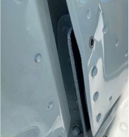 INVESTIGATIVE PHOTOS Photograph 2 – Right side Vertical stabilizer with missing rivet, from the NTSB investigation of Piper PA28R accident near Vero Beach, Florida, June 7, 2024