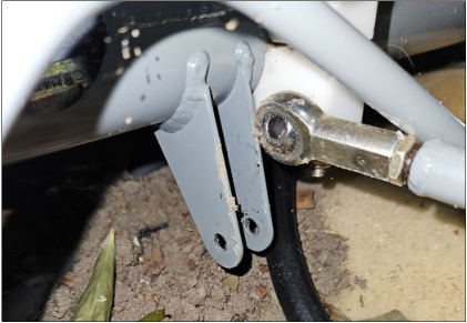 Photo 2: View of the elevator connecting rod attachment area missing its hardware, from the NTSB investigation of Amateur-built JA30 SUPERSTOL accident near Tennille, Georgia, June 8, 2024