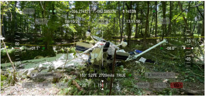 Photog rap h 2 – Ove rvie w of the airp lane at the accide nt site . (Courte sy of FAA), from the NTSB investigation of Cessna 182 accident near Telford, Tennessee, June 8, 2024