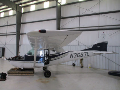 Photograph 1 – Front view left side of airplane showing damage to nose wheel, from the NTSB investigation of Cessna 172G accident near Greensboro, North Carolina, May 30, 2024