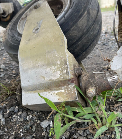 Photograph 3 – Nose Wheel and Fork (NTSB Photo), from the NTSB investigation of Amateur-built RV6 accident near Townsend, Delaware, June 14, 2024