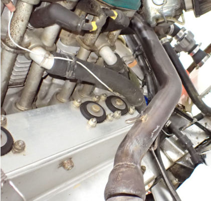Photograph 14 – No. 4 exhaust riser, from the NTSB investigation of Amateur-built SEAREY accident near New Ipswich, New Hampshire, June 25, 2024