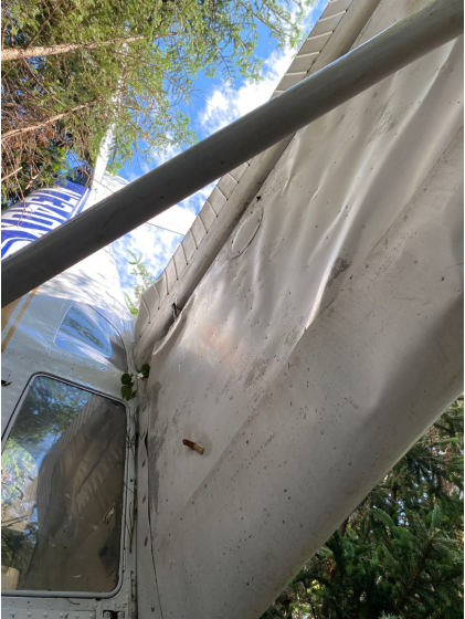 Photo 2 – View of Damage to Right Wing (FAA), from the NTSB investigation of Cessna 150 accident near Swans Island, Maine, June 25, 2024