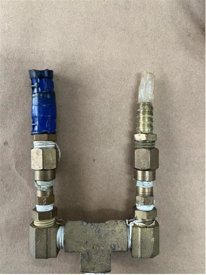 Photograph 5 – Fuel pump outlet manifold hose and fitting installation, from the NTSB investigation of Amateur-built AVENTURA II accident near Deland, Florida, June 26, 2024
