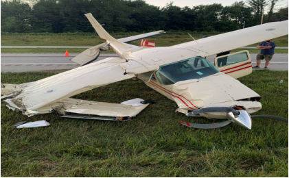 Photograph 1 – Forward view of aircraft at wreckage site., from the NTSB investigation of Cessna T210L accident near Albany, Ohio, June 30, 2024