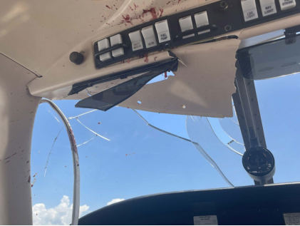 Photograph 3 – Bird impact damage from flight deck, from the NTSB investigation of Piper PA-28-181 accident near Clearwater, Florida, July 6, 2024