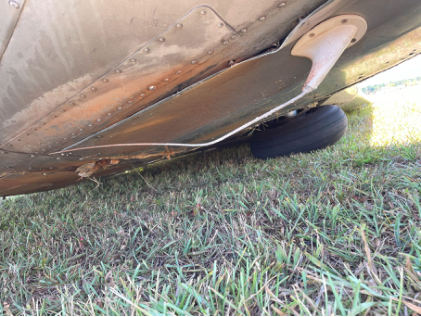 Photograph 2 – Lower Fuselage Postaccident, from the NTSB investigation of Globe GC1B accident near Peachtree City, Georgia, June 25, 2024
