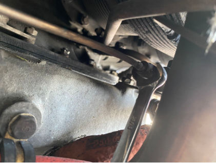 Photograph 2 – Loose Fuel Line B-Nut (FAA Photo), from the NTSB investigation of Piper PA-32RT-300T accident near Myerstown, Pennsylvania, July 4, 2024