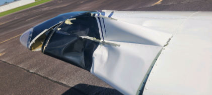 Photog rap h 3 – Vie w of the d amag e to the rig ht wing . (Courte sy of FAA), from the NTSB investigation of Piper PA28 accident near Cochran, Georgia, July 10, 2024