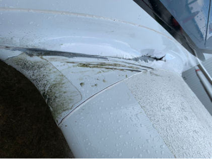 Photograph 1 – Left Wing Root External Damage, from the NTSB investigation of Cirrus Design CORP SR20 accident near Port St. Lucie, Florida, July 18, 2024
