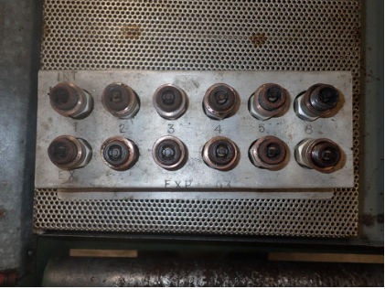 Photograph 3 – Spark plugs showing carbon fouling on cylinder No. 6., from the NTSB investigation of Amateur-built Glasair 3 accident near Oxford, Maine, August 3, 2024