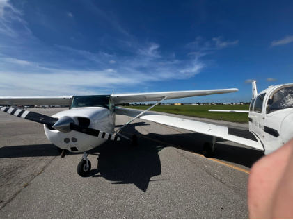Photograph 2 – Postaccident view of airplanes’ collision, from the NTSB investigation of Cessna 172N and Piper PA-28-161 accident near Immokalee, Florida, July 28, 2024