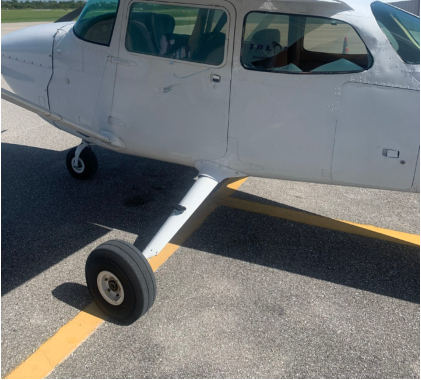 Photograph 6 – Damage to high wing airplane’s window, from the NTSB investigation of Cessna 172N and Piper PA-28-161 accident near Immokalee, Florida, July 28, 2024