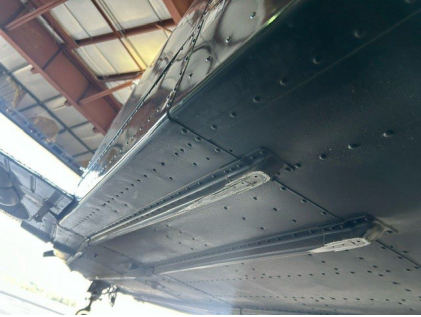 Photograph 3 – Damage to external longerons, from the NTSB investigation of Piper PA-32R-301T accident near North Myrtle Beach, South Carolina, July 30, 2024