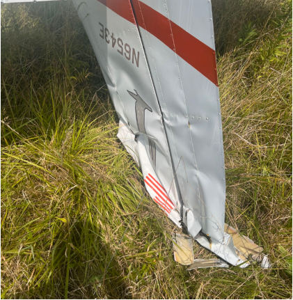 Photograph 2 – Vertical stabilizer and rudder postaccident, from the NTSB investigation of Cessna 172 accident near Medina, Ohio, August 6, 2024