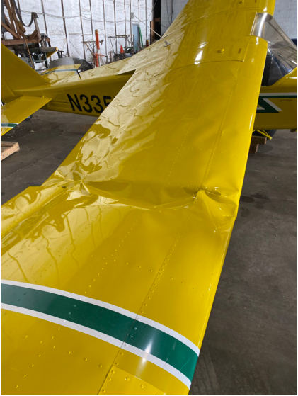 Photograph 2 – Right wing impact damage, from the NTSB investigation of Canadian Light Acft Sales &Svc BUSHCADDY EXPLORER R accident near Charleston, West Virginia, August 20, 2024