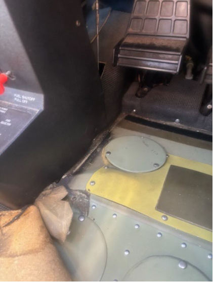 Photograph 4 – Floorboard buckling impact damage, from the NTSB investigation of Cessna 172 accident near Louisa, Virginia, August 22, 2024
