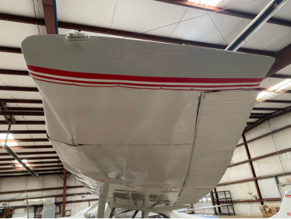 INVESTIGATIVE PHOTOS Photograph 2 – left wing tip bent up, from the NTSB investigation of Cessna 170B accident near Smithfield, North Carolina, June 16, 2024