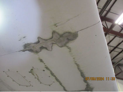 Photograph 4 – Right Wing Damage (FAA Photo), from the NTSB investigation of Mooney M20 accident near Oxford, Connecticut, September 6, 2024