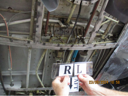 Photograph 5 – Bent Right Main Landing Gear Extension Rod (FAA Photo), from the NTSB investigation of Mooney M20 accident near Oxford, Connecticut, September 6, 2024