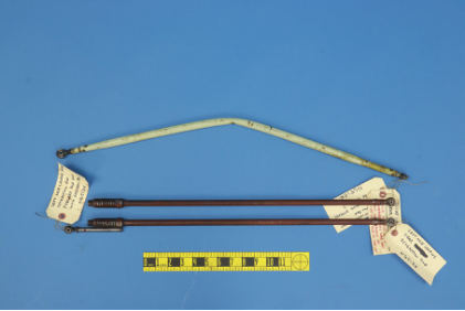 Photograph 6 - Bent Right Main Landing Gear Extension Rod and Nose Gear Extension Rods (NTSB Photo), from the NTSB investigation of Mooney M20 accident near Oxford, Connecticut, September 6, 2024