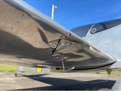 Photograph 2 – View of Right Wing Damage, from the NTSB investigation of Amateur-built WAIEX-B accident near Stratford, Connecticut, September 10, 2024
