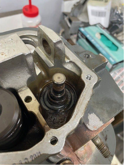 Photograph 10 – No 3. Exhaust Valve at Lycoming Materials Exam (NTSB Photo), from the NTSB investigation of Piper PA28 accident near Lagrange, Georgia, September 23, 2024