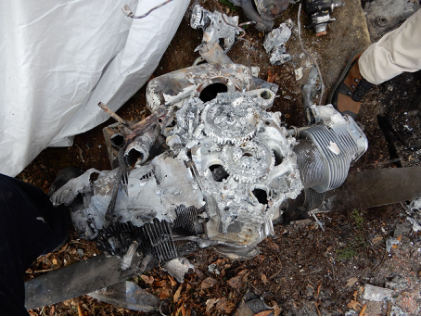 Photograph 9 - Engine (NTSB Photo), from the NTSB investigation of Cessna 150F accident near Wilder, Tennessee, October 31, 2024