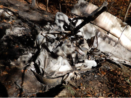 Photograph 3 – Engine and Propeller (NTSB Photo), from the NTSB investigation of Cessna 150F accident near Wilder, Tennessee, October 31, 2024