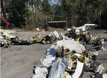 Photograph 5 – View of right wing looking towards fuselage during wreckage layout. (NTSB), from the NTSB investigation of Cessna 208 accident near Pierson, Florida, February 14, 2025
