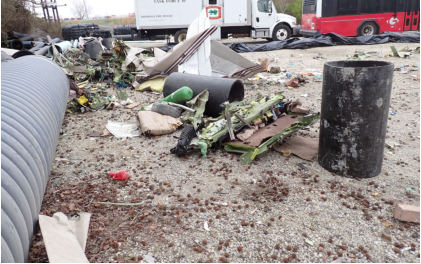 Photograph 1 – Empennage near end of wreckage path. (NTSB), from the NTSB investigation of Raytheon Aircraft Company A36 accident near Greenville, North Carolina, March 14, 2025