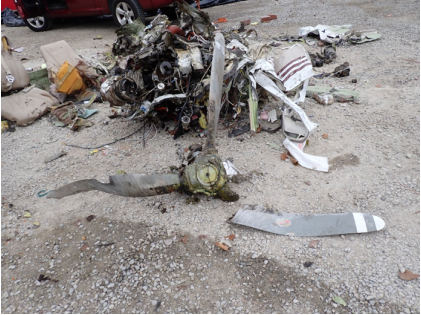 Photograph 4 – Propeller damage after recovery. (NTSB), from the NTSB investigation of Raytheon Aircraft Company A36 accident near Greenville, North Carolina, March 14, 2025
