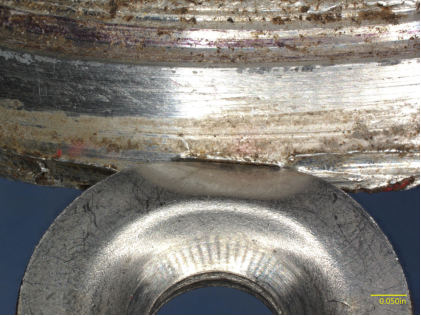 Photograph 4 – Close up of washer impression on plug, from the NTSB investigation of Mx Aircraft Tech PTY LTD MXS accident near Hampton, Virginia, April 24, 2025