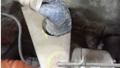 Photograph 11 – Fuel line going from firewall to fuel strainer, from the NTSB investigation of Piper PA28 accident near Louisville, Kentucky, October 11, 2024