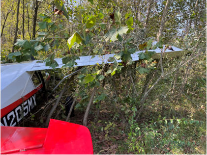 INVESTIGATIVE PHOTOS Photograph 1 – Main wreckage, tail view of right wing, from the NTSB investigation of Maule M8 accident near Rowlesburg, West Virginia, October 12, 2024