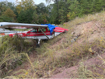 Photograph 4 – Angle of Embankment Compared to the Airplane, from the NTSB investigation of Cessna 182 accident near South Charleston, West Virginia, October 12, 2024