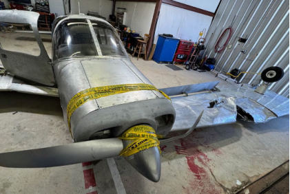 Photograph 3 – View of airplane in hangar., from the NTSB investigation of Piper PA-28-151 accident near Newnan, Georgia, October 16, 2024