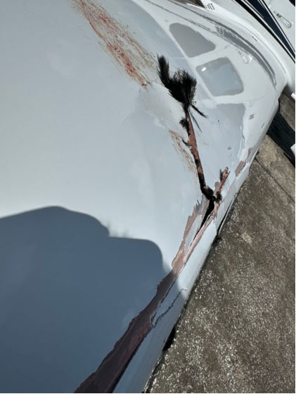 Photograph 2 – Right Side View of Right Wing Damage, from the NTSB investigation of Cirrus Design CORP SR20 accident near Sebring, Florida, October 24, 2024
