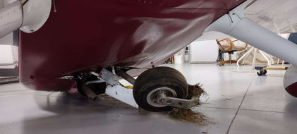 Photograph 1 – Lower fuselage accident damage, from the NTSB investigation of Amateur-built VANS RV6A accident near Taylorsville, Kentucky, November 3, 2024