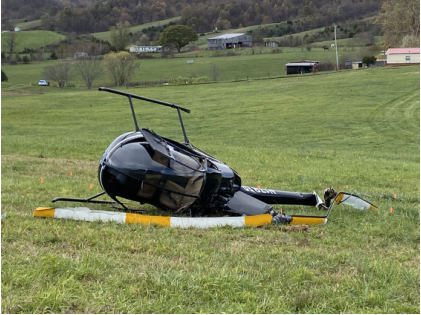 INVESTIGATIVE PHOTOS Photograph 1 – Main wreckage, from the NTSB investigation of Robinson Helicopter Company R22 MARINER accident near Parrottsville, Tennessee, November 13, 2024