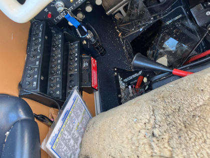 ON SCENE PHOTOGRAPHS Photograph 6 – Cockpit image with fuel selector visible in the “LEFT” position, from the NTSB investigation of Beech A36 accident near Doylestown, Pennsylvania, November 18, 2024