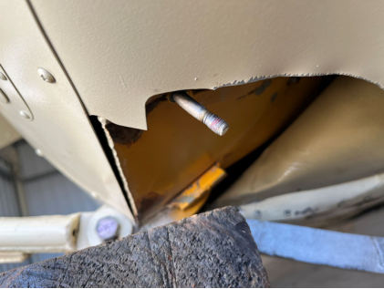 Photograph 7 – Gear leg retention bracket bolt with locknut threads, from the NTSB investigation of Amateur-built BAKENG DUCE accident near Plant City, Florida, November 17, 2024