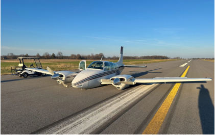 Photograph 1 – Postaccident view of airplane on runway, from the NTSB investigation of Beech B95A accident near Murray, Kentucky, December 19, 2024