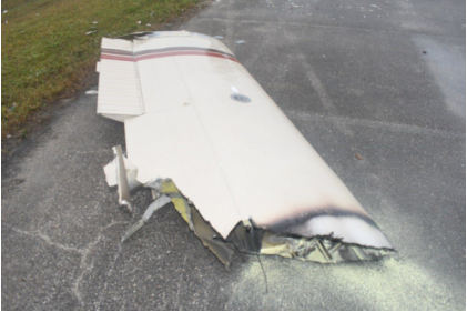 Photograph 6 – Left Wing As Found (Courtesy FAA), from the NTSB investigation of Beech BE-76 accident near Melbourne, Florida, December 26, 2024