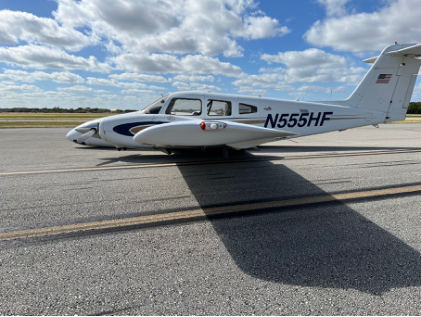 Photograph 2 – Left Side View Showing Airplane Where Came to Rest on Runway, from the NTSB investigation of Piper PA-44-180 accident near Pompano Beach, Florida, January 10, 2025
