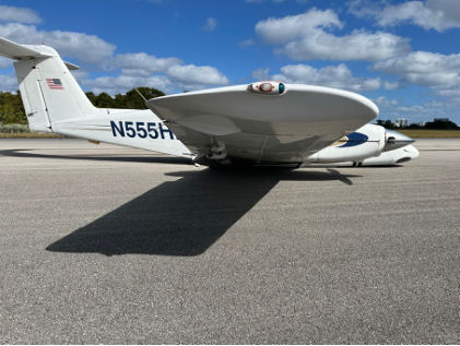 Photograph 4 – Right Side View Showing Airplane Where Came to Rest on Runway, from the NTSB investigation of Piper PA-44-180 accident near Pompano Beach, Florida, January 10, 2025
