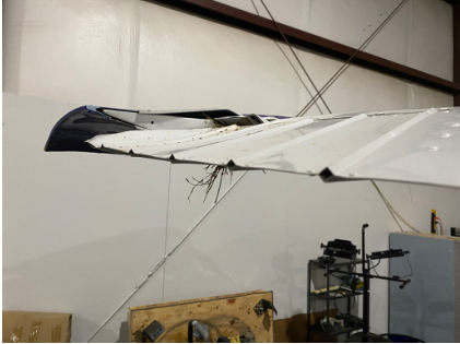 Photograph 2 – View of damaged left aileron., from the NTSB investigation of Cessna 172P accident near Clarksville, Tennessee, February 3, 2025