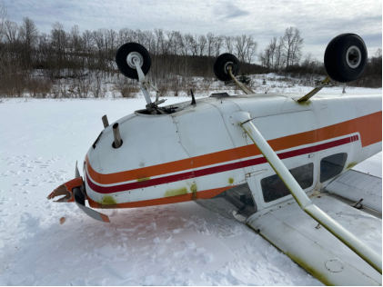 Photograph 1 – Accident airplane inverted, from the NTSB investigation of Cessna 172C accident near Argyle, New York, February 20, 2025